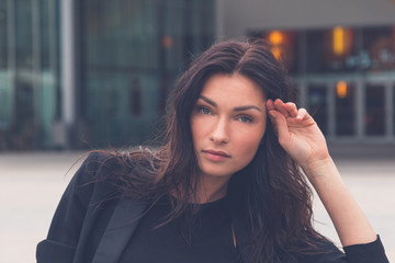 Beautiful girl posing on a bench