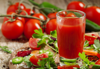 Fresh juice from the mix of vegetables with vegetables and herbs