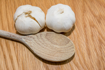Garlic with wooden spoon
