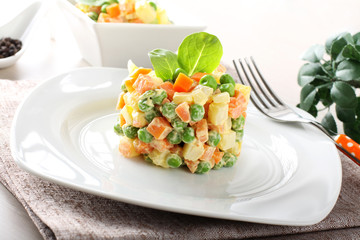Russian salad with peas, carrots, potatoes and mayonnaise - 83601448