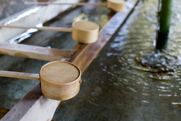 A cleansing well in a peaceful Japanese temple.
