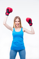 Happy woman with boxing gloves