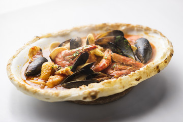 italian seafood stew baked in bread loaf