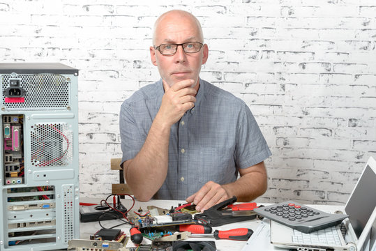 a technician repairing a computer
