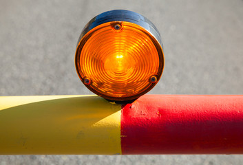 Red light on the automatic road barrier