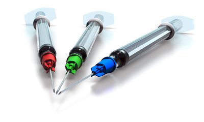 Three medical syringes isolated on a white background