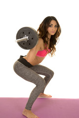 woman fitness pink bra bar squat side
