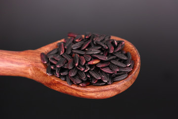 Black Nerone Rice in wooden spoon