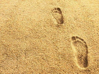 foot prints on sea beach sand