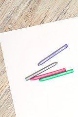 Pastel crayons on a sheet of paper