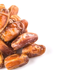 Date fruits over white background