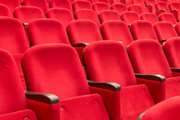 Fototapeta premium empty red cinema or theatre seats