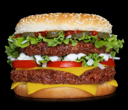Big hamburger isolated on black background