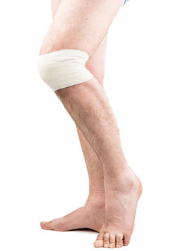 Man With Elastic Bandage On Knee