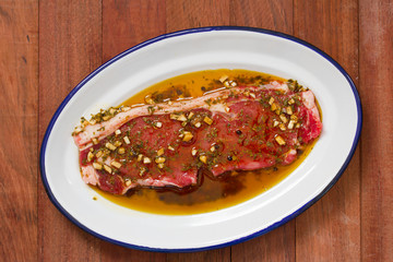 raw meat in sauce