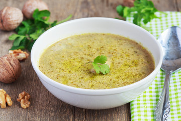 Traditional soup kharcho of beef broth with walnuts, cilantro 