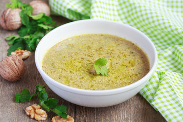 Traditional soup kharcho of beef broth with walnuts, cilantro 