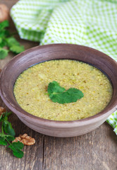 Traditional soup kharcho of beef broth with walnuts, cilantro