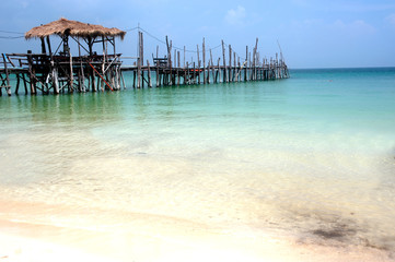 Traditional wooden bridge on the beach.