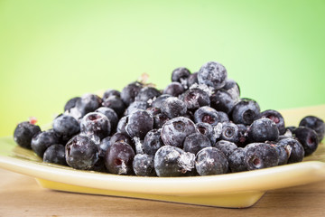 blueberries on a wooden table