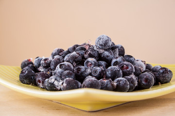 blueberries on a wooden table