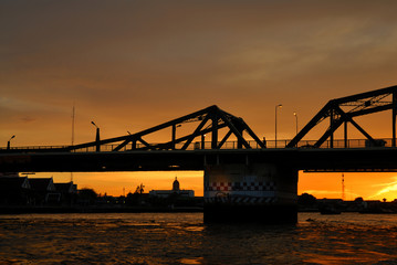 Silhouette of steel bridge