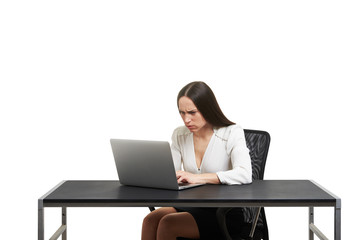 woman sitting at the table with laptop
