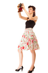  Girl taking self portrait from vintage camera