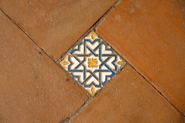 Colorful floor tiles in St Johns Monastery, Toledo, Spain