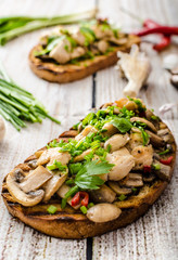 Toast with mushrooms and fried chicken,