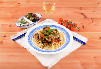 Trofie pasta with shellfish mollusks and fish 