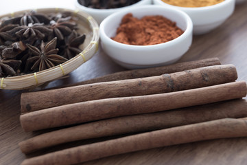 Wooden table of colorful spices
