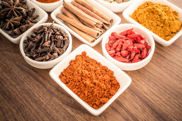 Wooden table of colorful spices