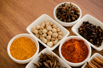 Wooden table of colorful spices