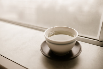 Window and coffee cup