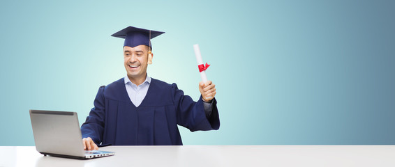 smiling adult student in mortarboard with diploma