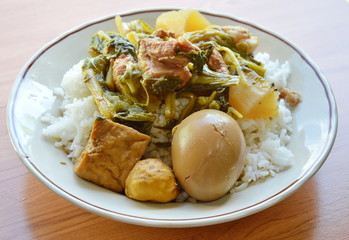 egg boiled brown sauce and boiled vegetable with pork rib