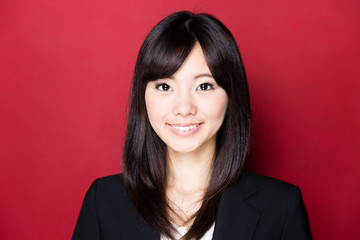 asian businesswoman on red background