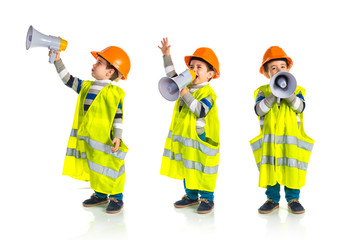 Kid dressed like workman shouting by megaphone