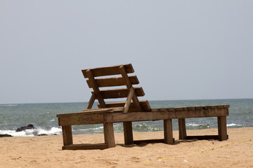 Plank bed  on a beach. India Goa.