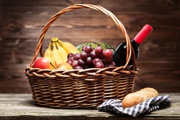 Zelfklevend Fotobehang Basket full of fresh fruit © George Dolgikh