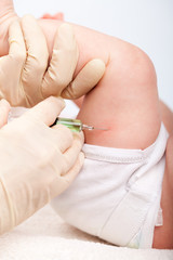 Infant gets an injection