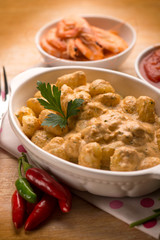 gnocchi with shrimp sauce and tomatoes, selective focus