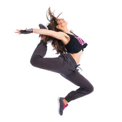 Teenager girl jumping in hip hop style