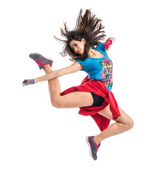 Teenager girl jumping in street dance style