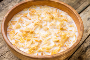 Corn flakes with milk. Breakfast background
