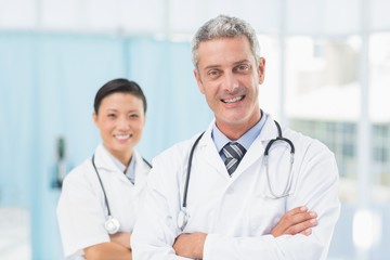 Fototapeta premium Confident male and female doctors