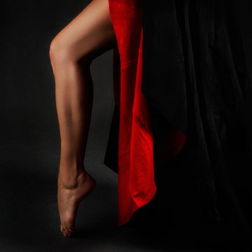 Beautiful leg with red and black skirt