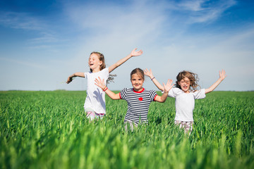 Little girls running on the field
