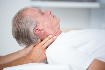 Fototapeta na wymiar Man receiving neck massage 
